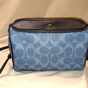 Blue Coach crossbody purse.
